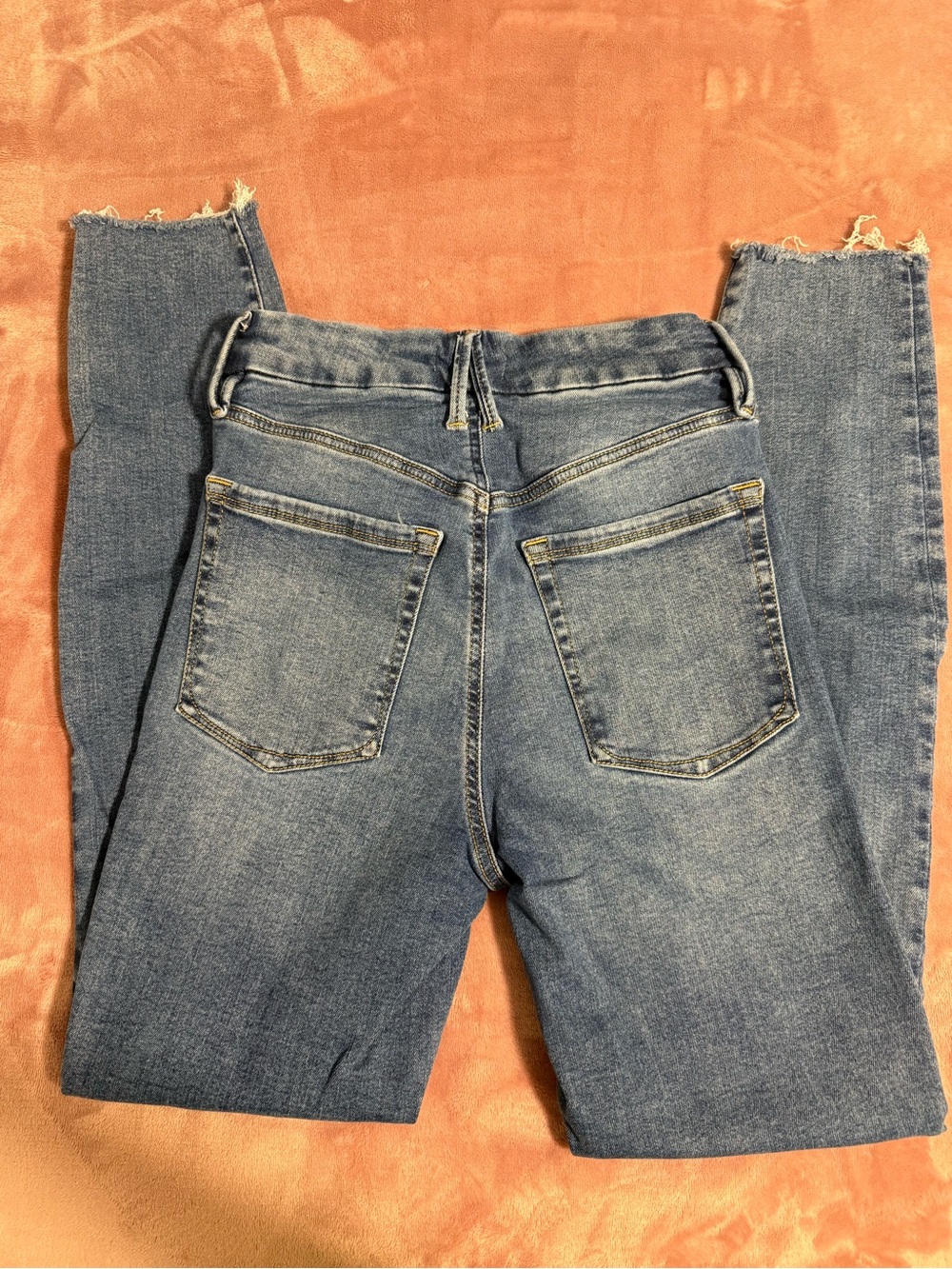 Good American Light Blue Skinny Jeans with Frayed Hem